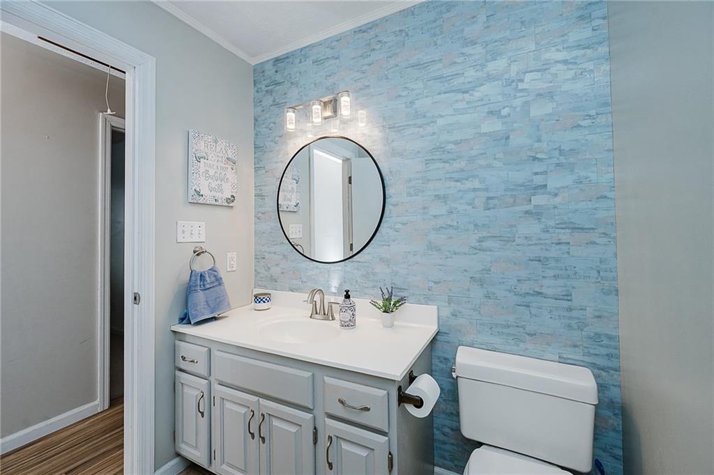 979 Barclay Road Indiana, PA 15701 - Photo 15 of 32 a bathroom with a sink mirror vanity and toilet