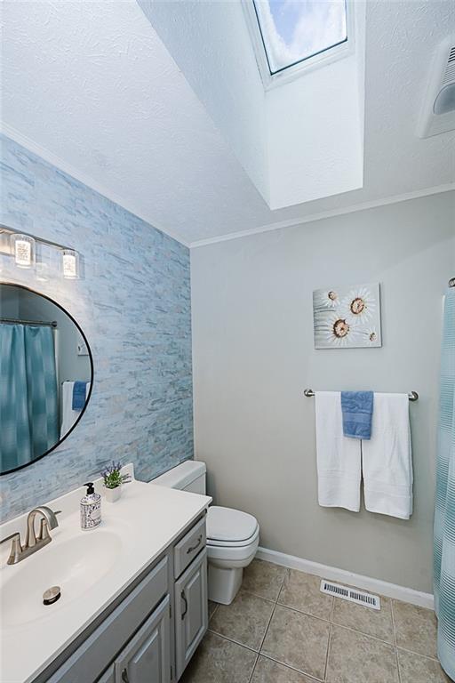 979 Barclay Road Indiana, PA 15701 - Photo 16 of 32 a bathroom with a toilet sink vanity and mirror