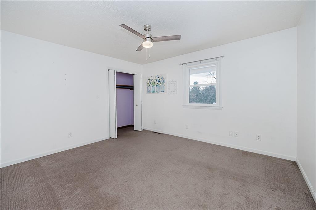 979 Barclay Road Indiana, PA 15701 - Photo 25 of 32 an empty room with a window and a ceiling fan