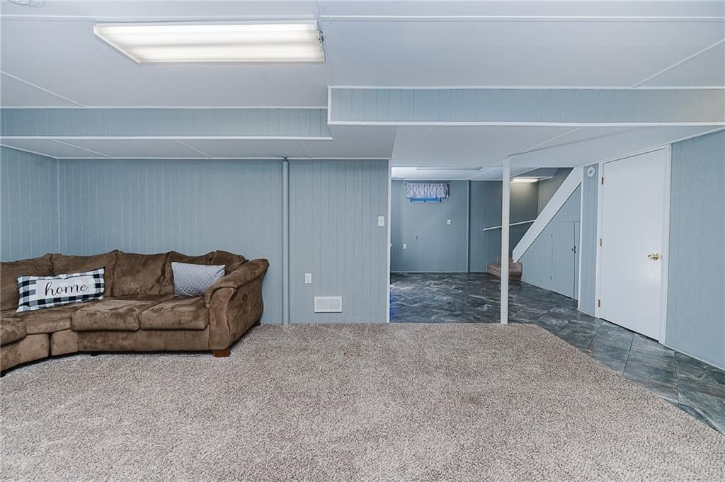 979 Barclay Road Indiana, PA 15701 - Photo 29 of 32 a living room with furniture and a ceiling fan