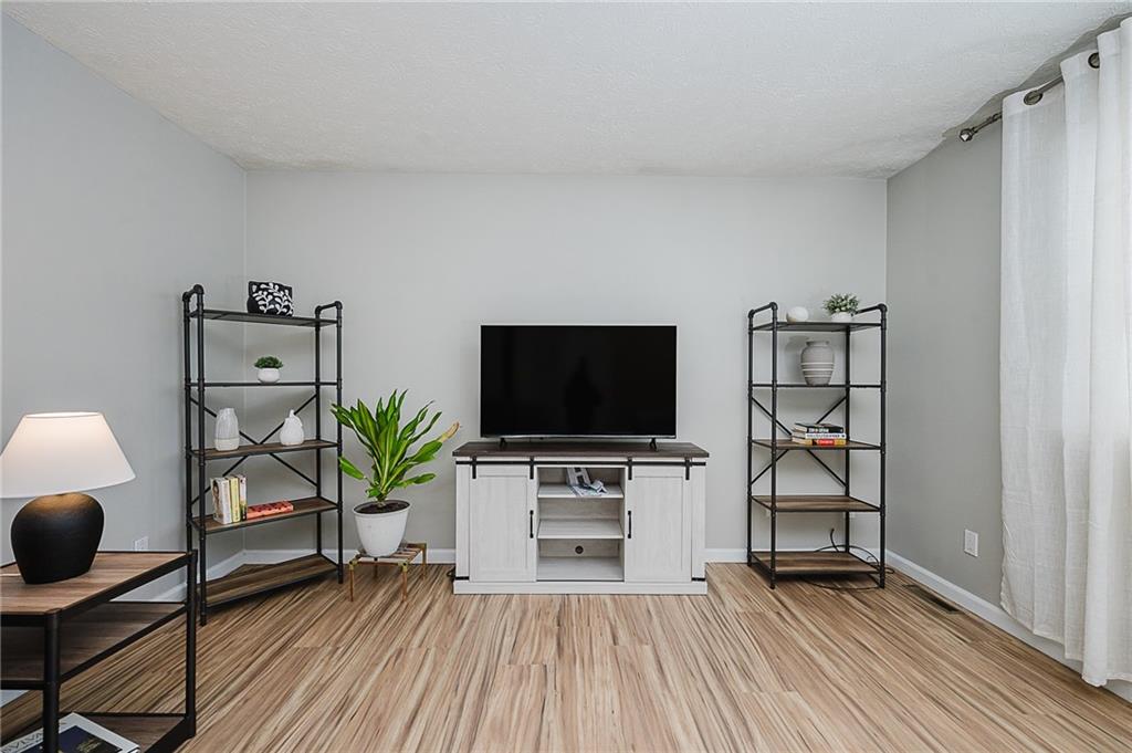 979 Barclay Road Indiana, PA 15701 - Photo 7 of 32 a living room with furniture and a flat screen tv