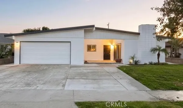 a front view of house with yard