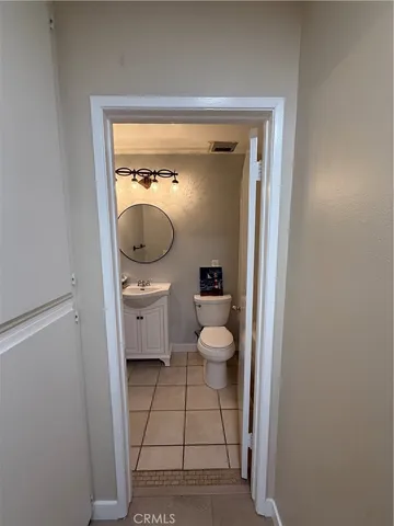 a bathroom with a toilet and a sink