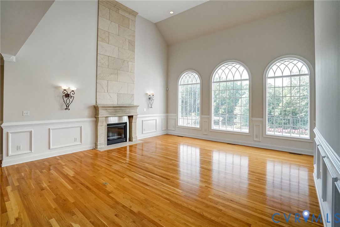 721 Meadow View Ridge Manakin-Sabot, VA 23103 - Photo 6 of 45 a view of empty room with fireplace and wooden floor