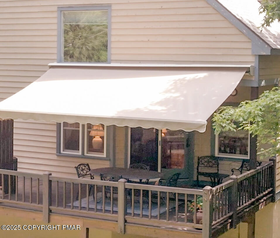 2161 Oak Hill Drive Canadensis, PA 18325 - Photo 15 of 64 Back deck with retractable awning open