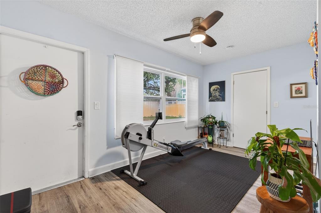 3740 58th Street North, Unit 110 St. Petersburg, FL 33710 - Photo 24 of 27 a living room with furniture and a window