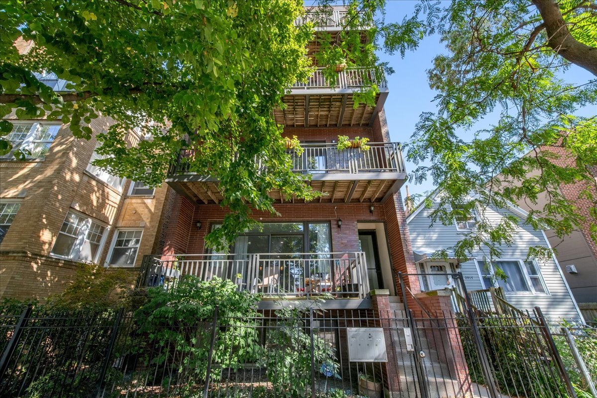 2019 North Whipple Street, Unit 1 Chicago, IL 60647 - Photo 1 of 33 an aerial view of a house