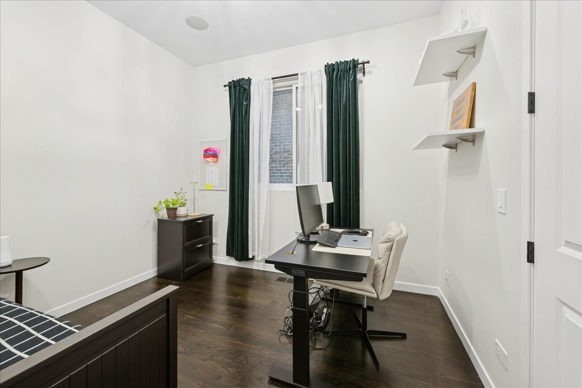 2019 North Whipple Street, Unit 1 Chicago, IL 60647 - Photo 14 of 33 a view of a workspace with furniture and a window