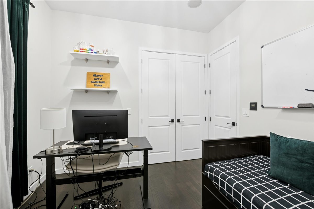 2019 North Whipple Street, Unit 1 Chicago, IL 60647 - Photo 15 of 33 a living room with furniture and a flat screen tv