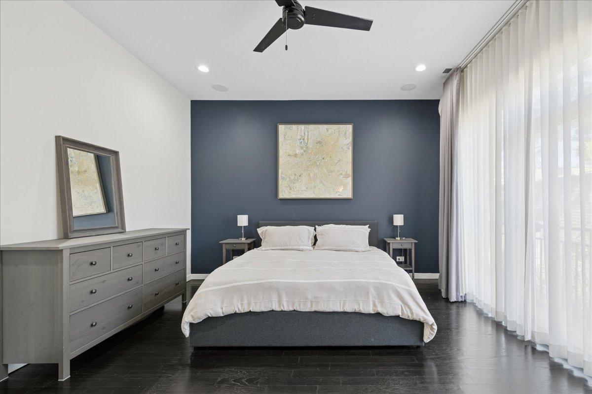 2019 North Whipple Street, Unit 1 Chicago, IL 60647 - Photo 20 of 33 a bedroom with a bed and a dresser