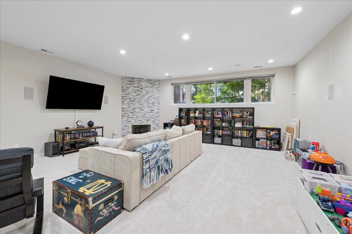 2019 North Whipple Street, Unit 1 Chicago, IL 60647 - Photo 25 of 33 a living room with furniture and a flat screen tv