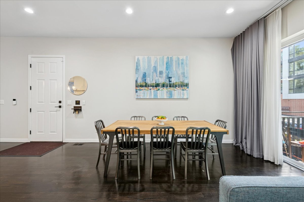 2019 North Whipple Street, Unit 1 Chicago, IL 60647 - Photo 7 of 33 a view of a a dining room with furniture window and wooden floor