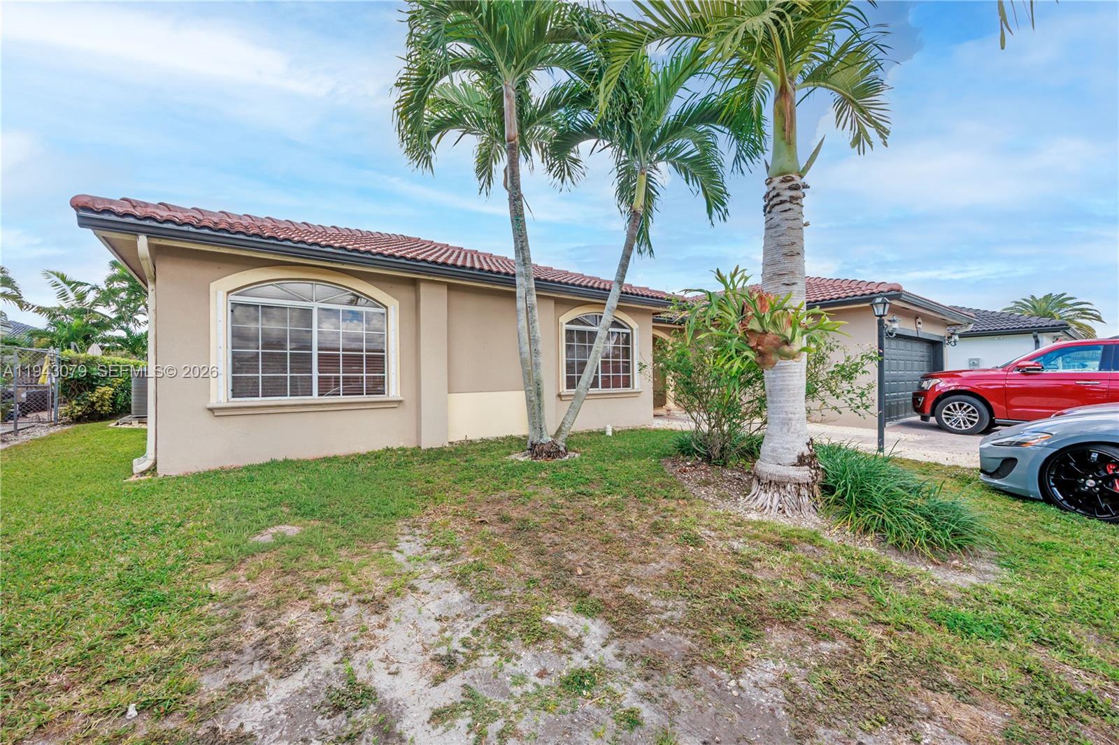 15330 Southwest 170th Terrace Miami, FL 33187 - Photo 34 of 39 Left side of the property.