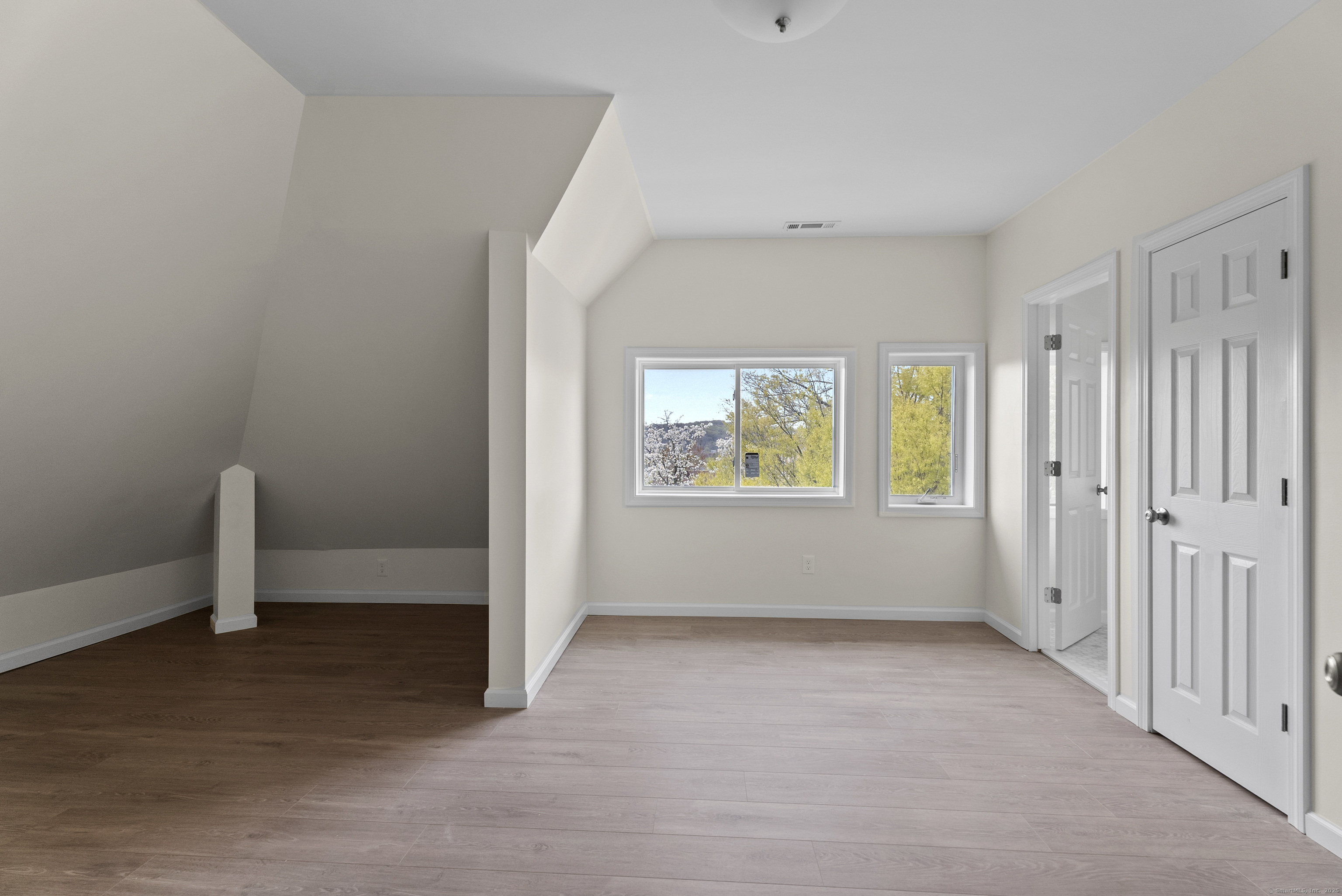72 South Main Street, Unit 3A Wallingford, CT 06492 - Photo 7 of 14 an empty room with windows