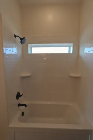 a bathroom with a bathtub