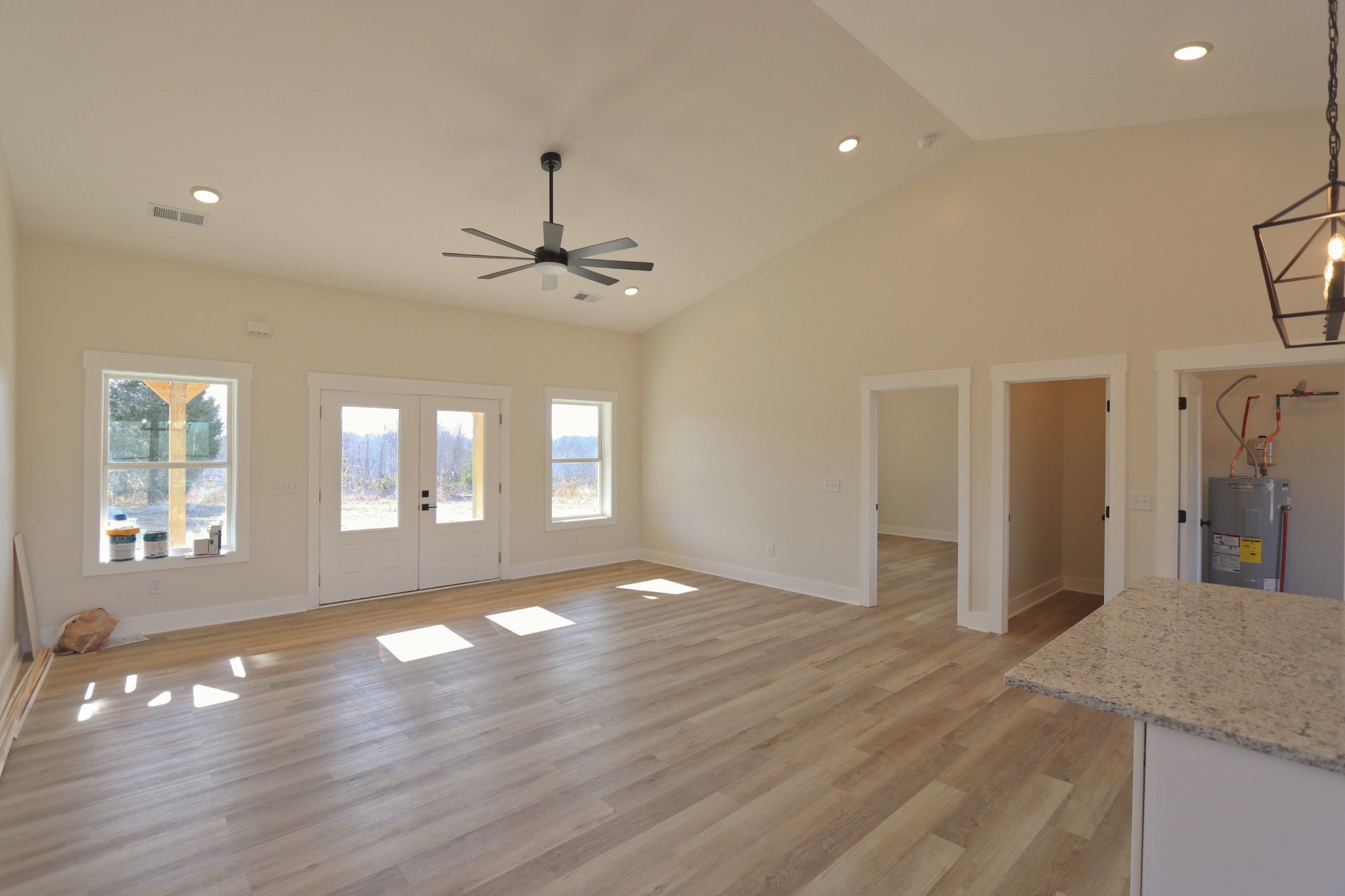 2679 Dotson Road Lafayette, TN 37083 - Photo 9 of 25 a view of an empty room with wooden floor and a window
