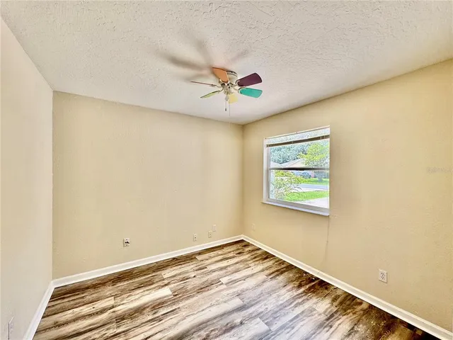 a view of a room with a large window
