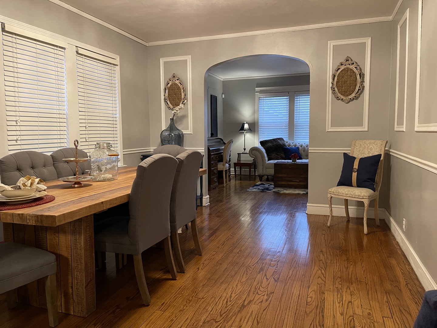 10441 South Prairie Avenue Chicago, IL 60628 - Photo 15 of 36 a view of a dining room with furniture and wooden floor