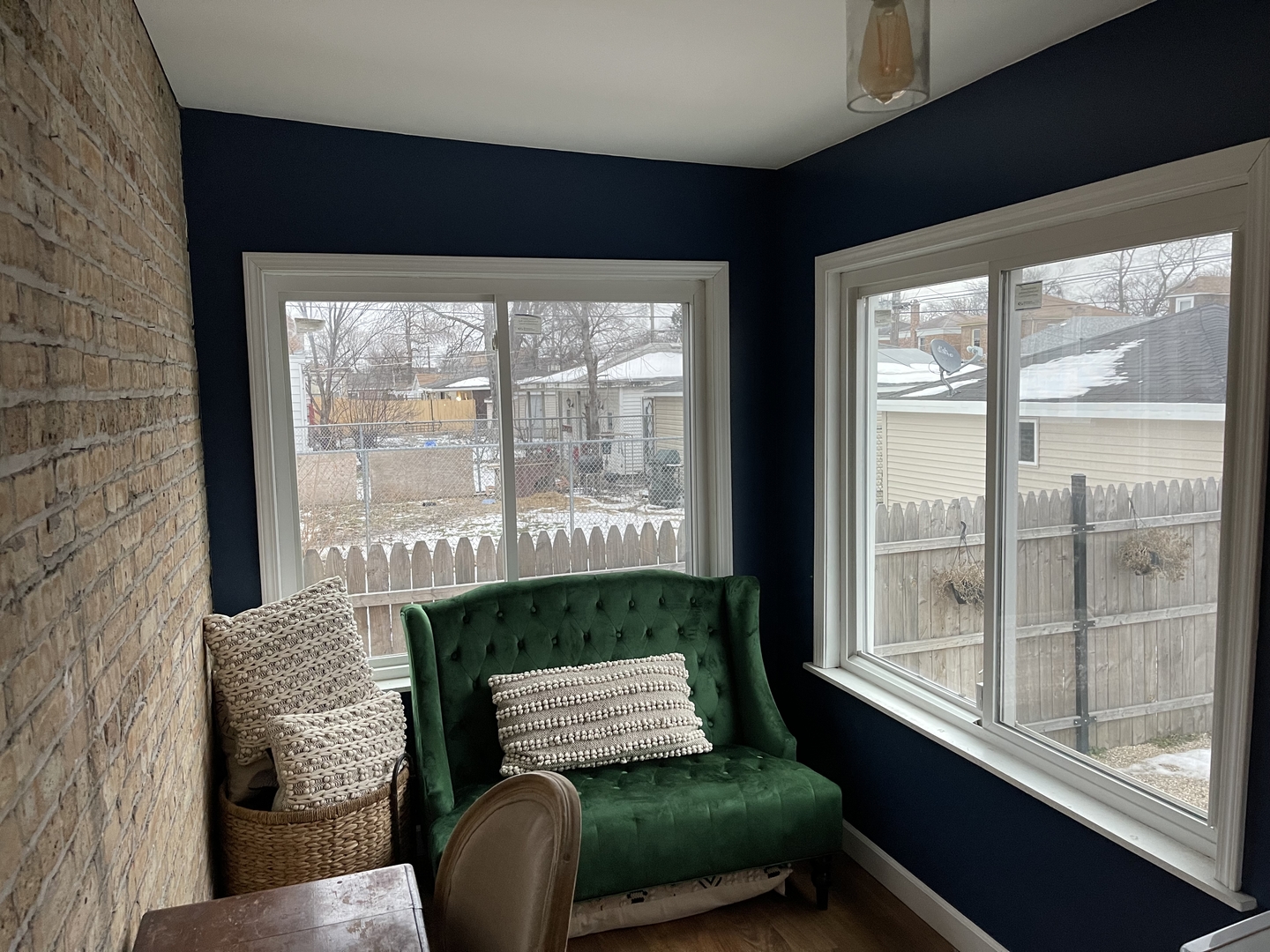 10441 South Prairie Avenue Chicago, IL 60628 - Photo 16 of 36 a living room with furniture and a fireplace