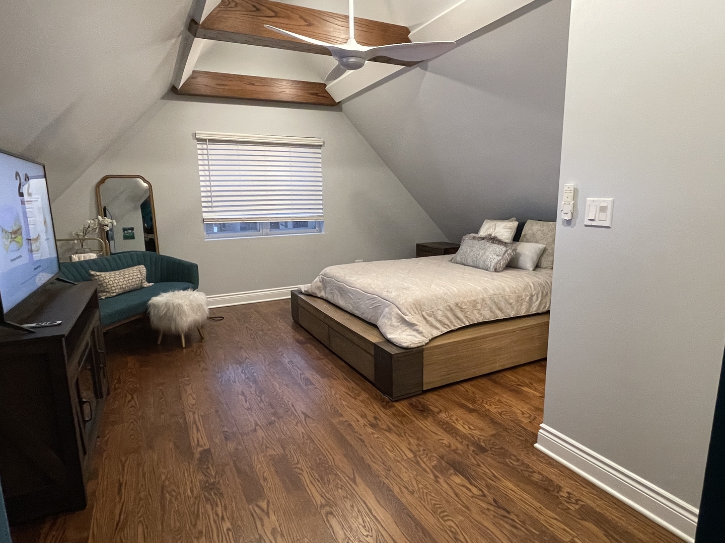 10441 South Prairie Avenue Chicago, IL 60628 - Photo 21 of 36 a living room with a bed furniture and a window