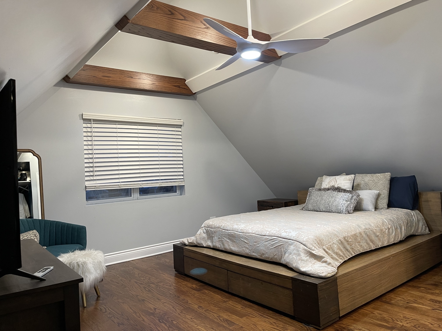 10441 South Prairie Avenue Chicago, IL 60628 - Photo 24 of 36 a bedroom with a bed and window