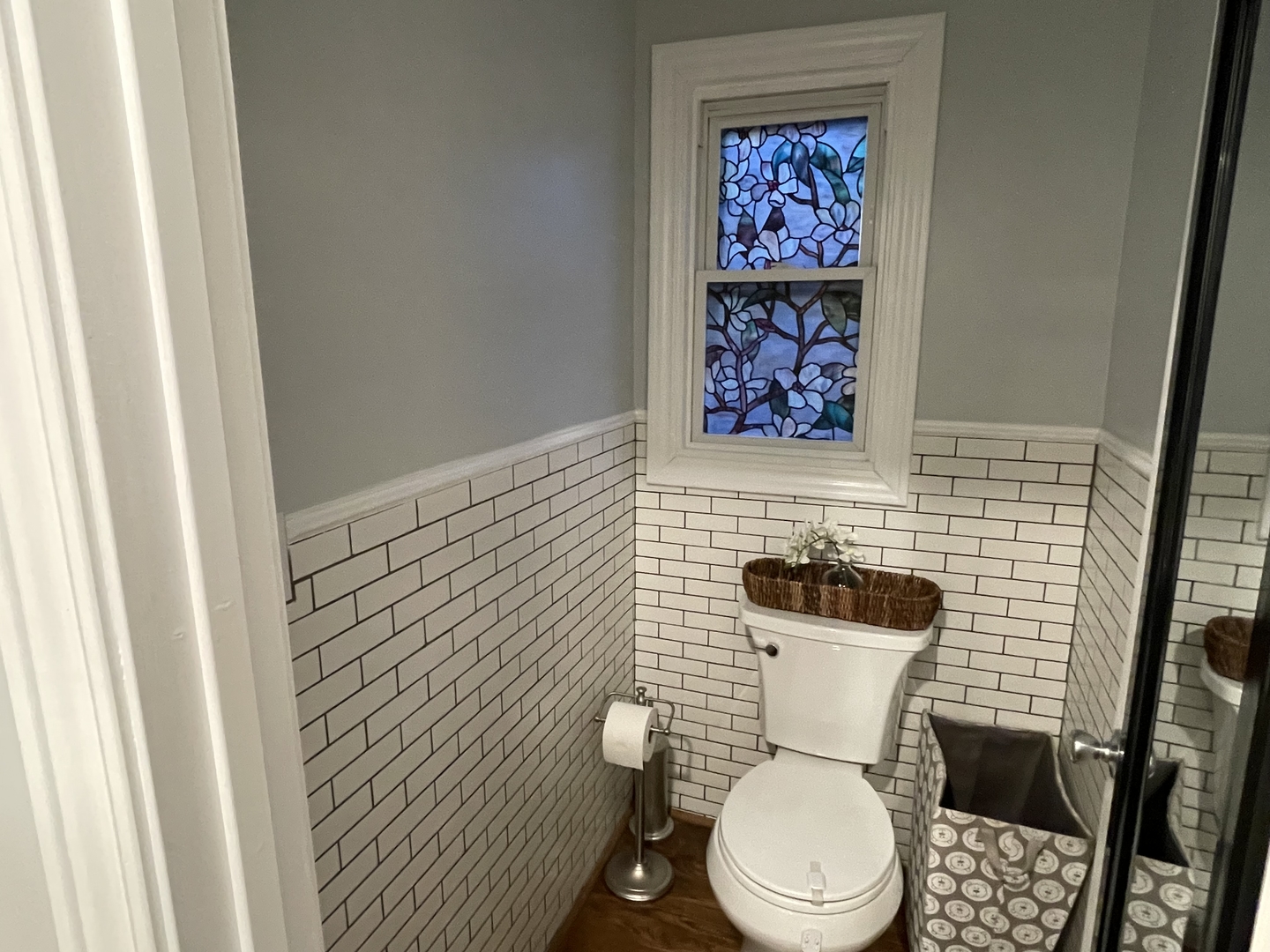 10441 South Prairie Avenue Chicago, IL 60628 - Photo 28 of 36 a bathroom with a toilet and a shower curtain