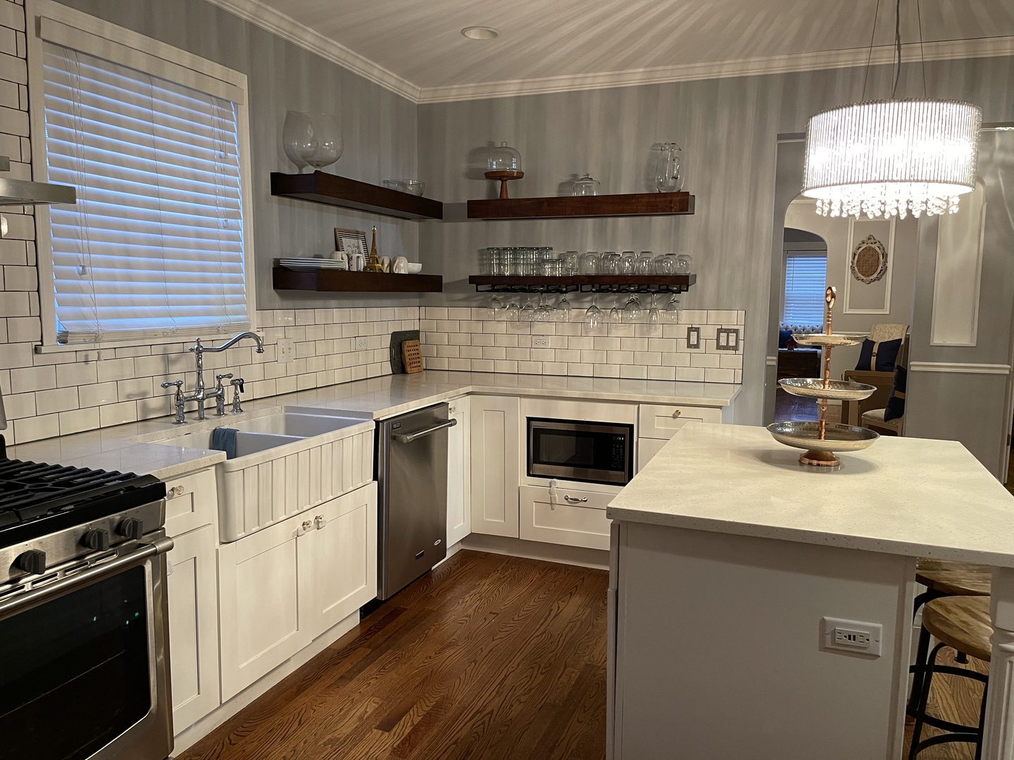 10441 South Prairie Avenue Chicago, IL 60628 - Photo 8 of 36 a kitchen with a sink stove and microwave