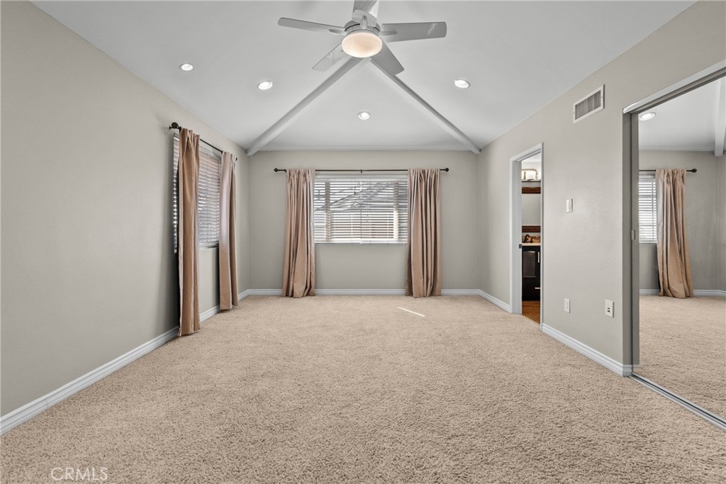 19573 Pine Valley Avenue Porter Ranch, CA 91326 - Photo 24 of 48 a view of a livingroom with a ceiling fan and window