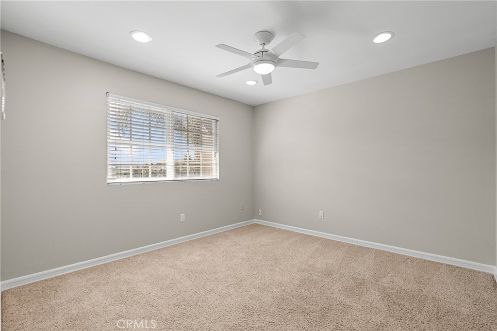 19573 Pine Valley Avenue Porter Ranch, CA 91326 - Photo 30 of 48 a view of an empty room with a window