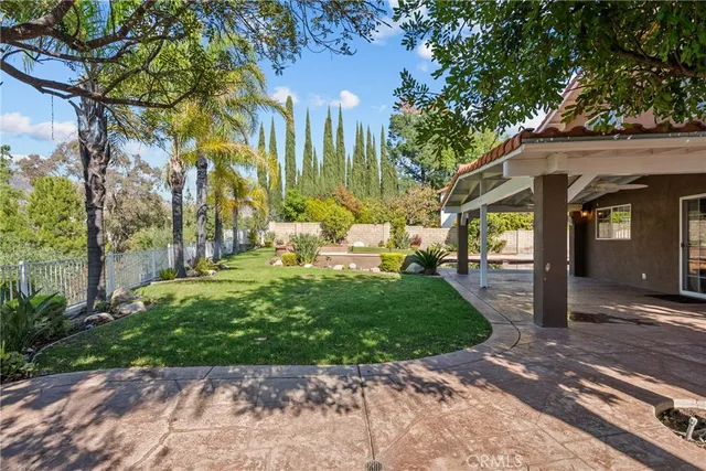 a view of a garden with an outdoor space