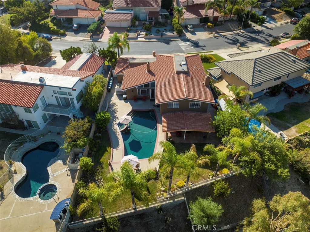 19573 Pine Valley Avenue Porter Ranch, CA 91326 - Photo 46 of 48 an aerial view of multiple houses with yard
