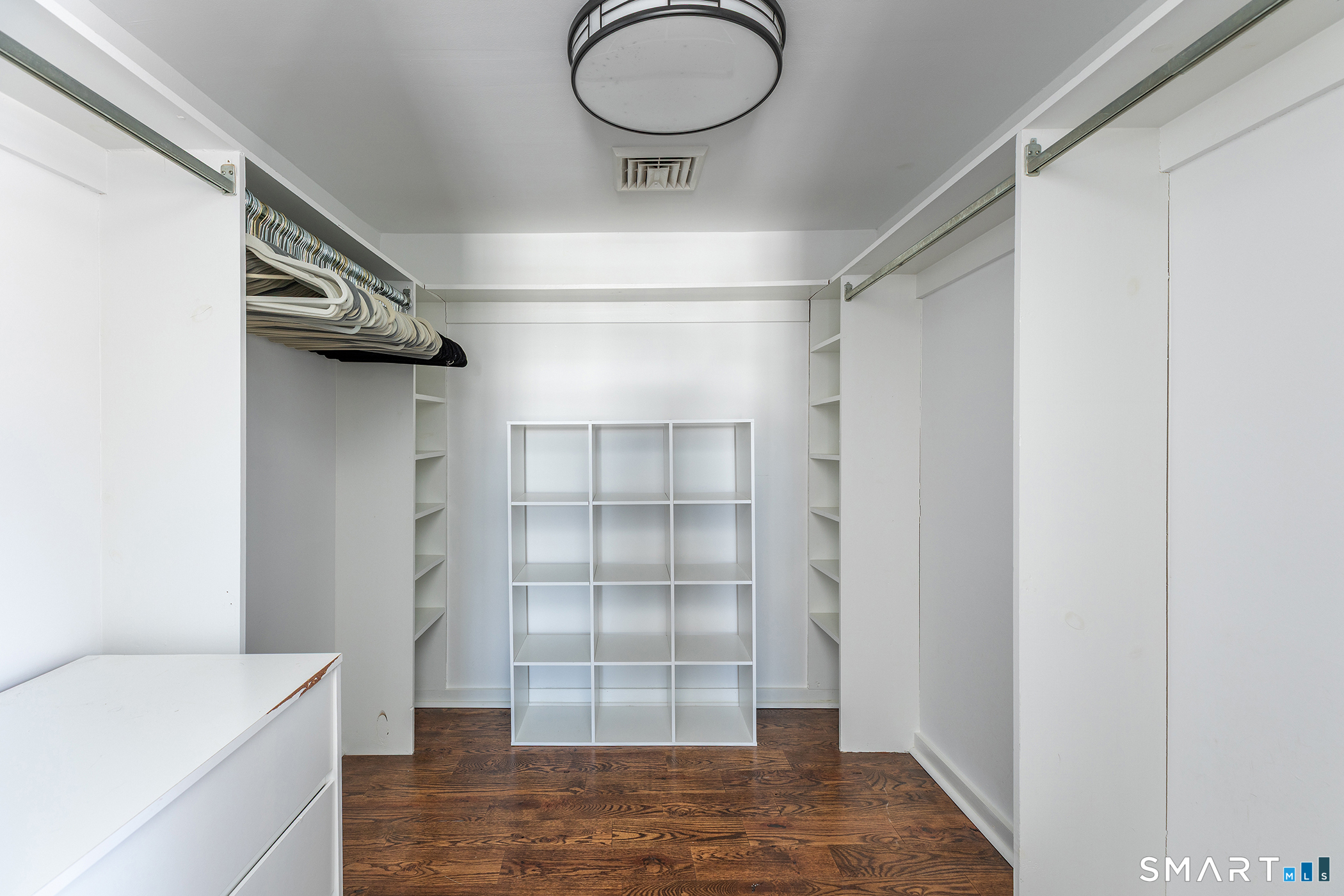 403 Beach Street Litchfield, CT 06759 - Photo 24 of 34 a view of walk in closet with empty racks