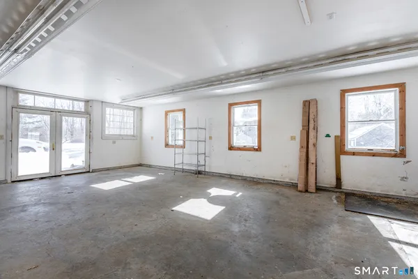 an empty room with windows