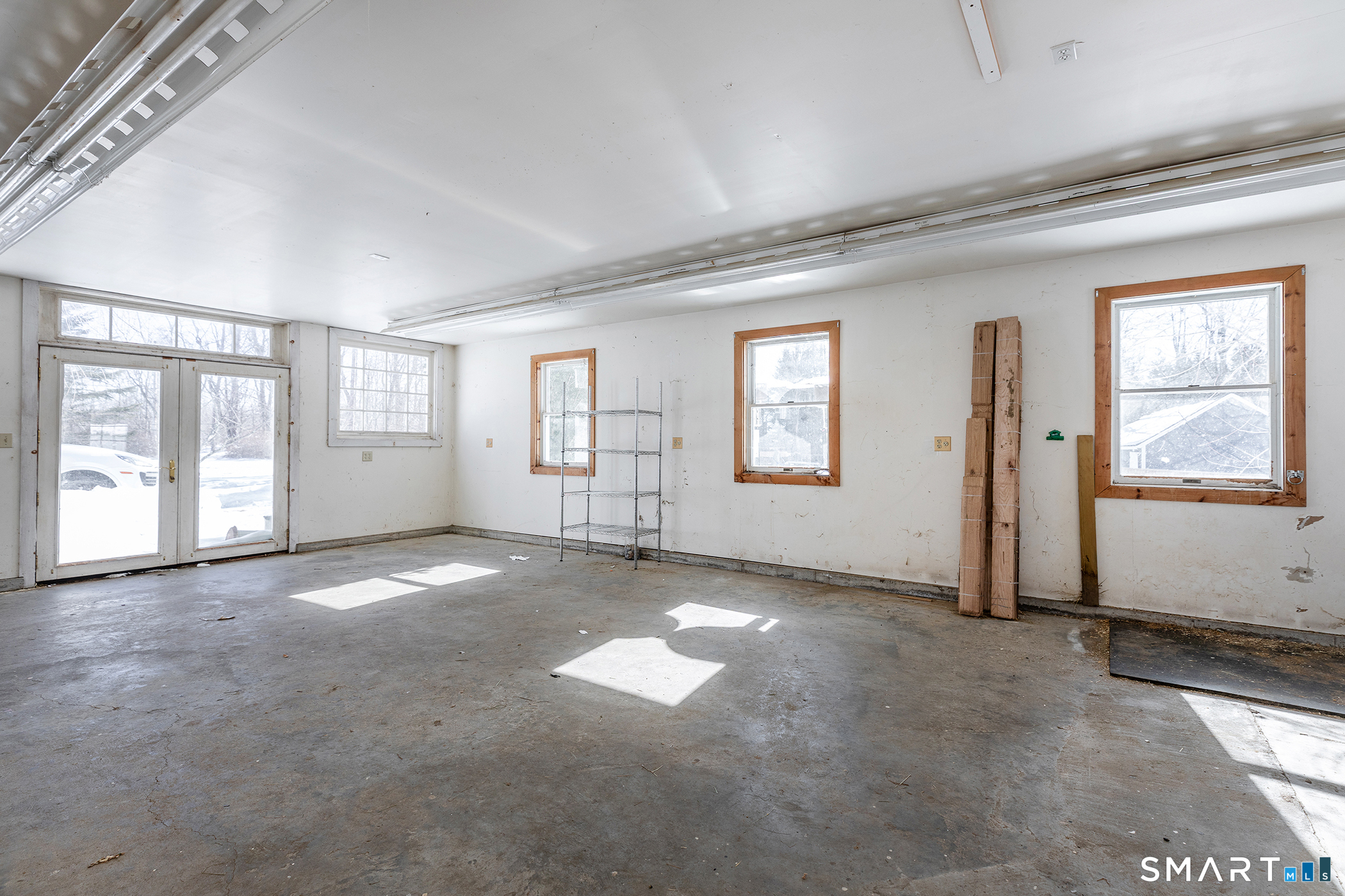 403 Beach Street Litchfield, CT 06759 - Photo 30 of 34 an empty room with windows