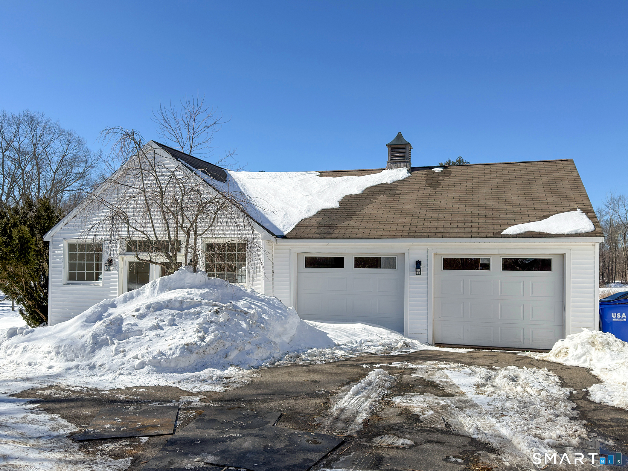403 Beach Street Litchfield, CT 06759 - Photo 31 of 34 a front view of a house with a yard