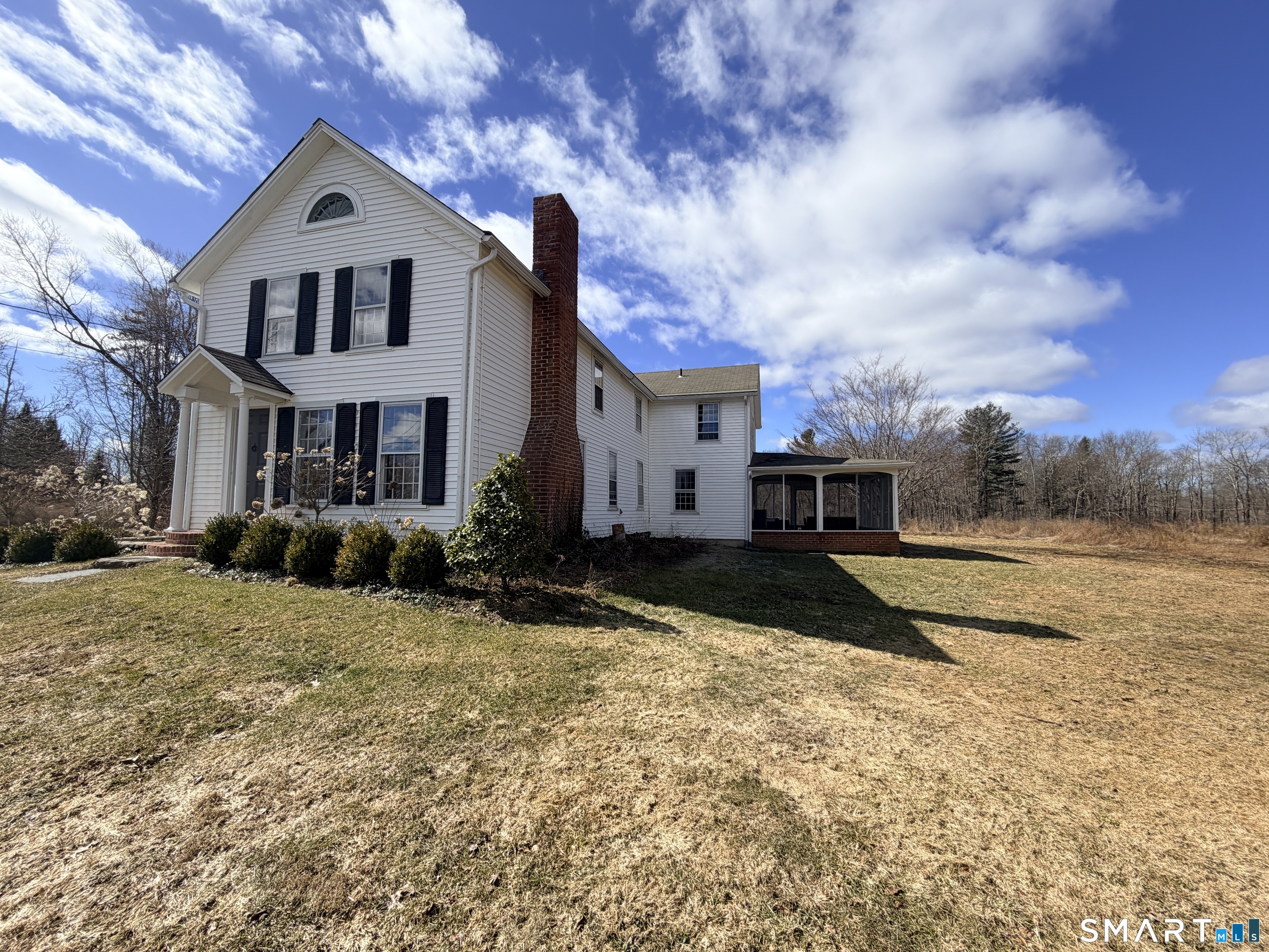 403 Beach Street Litchfield, CT 06759 - Photo 4 of 34 a front view of a house with a yard