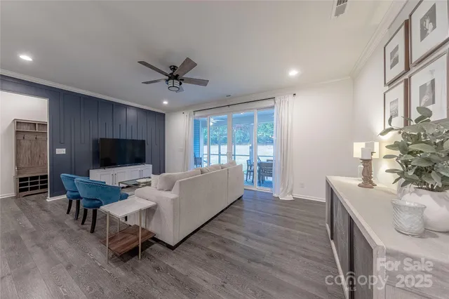 a spacious bedroom with a bed and a window