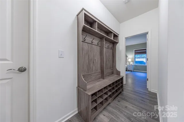 a utility room with closet dryer and washer