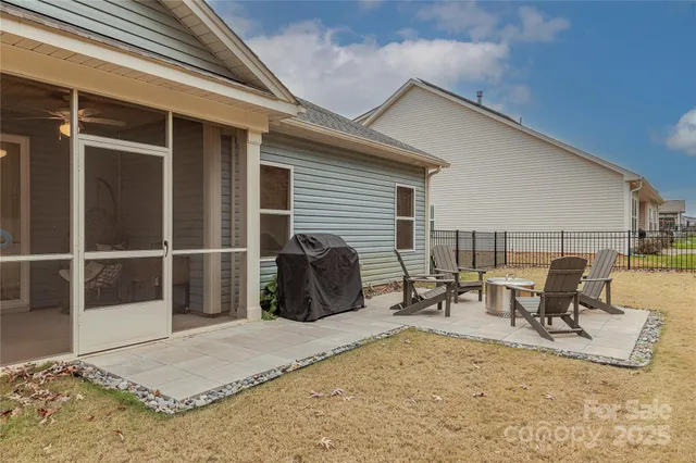 a view of a yard with a tree