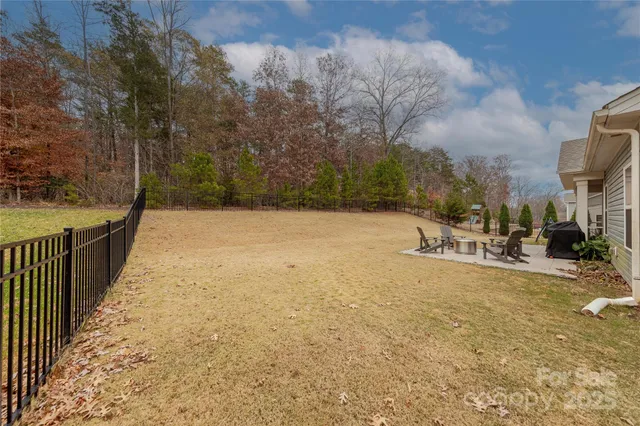 an aerial view of residential house with outdoor space