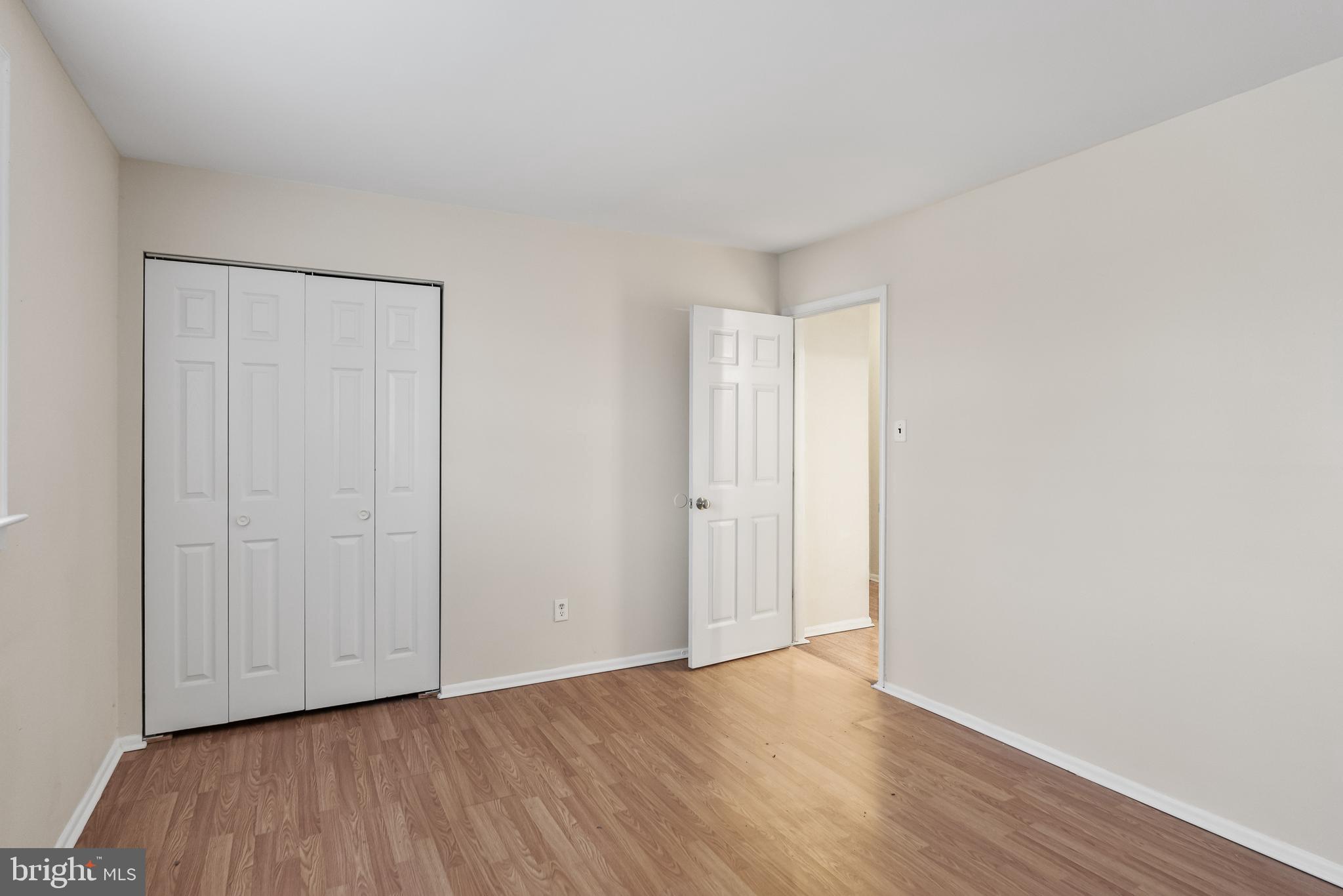 19 Turtle Creek Drive Medford, NJ 08055 - Photo 6 of 9 a view of an empty room and wooden floor
