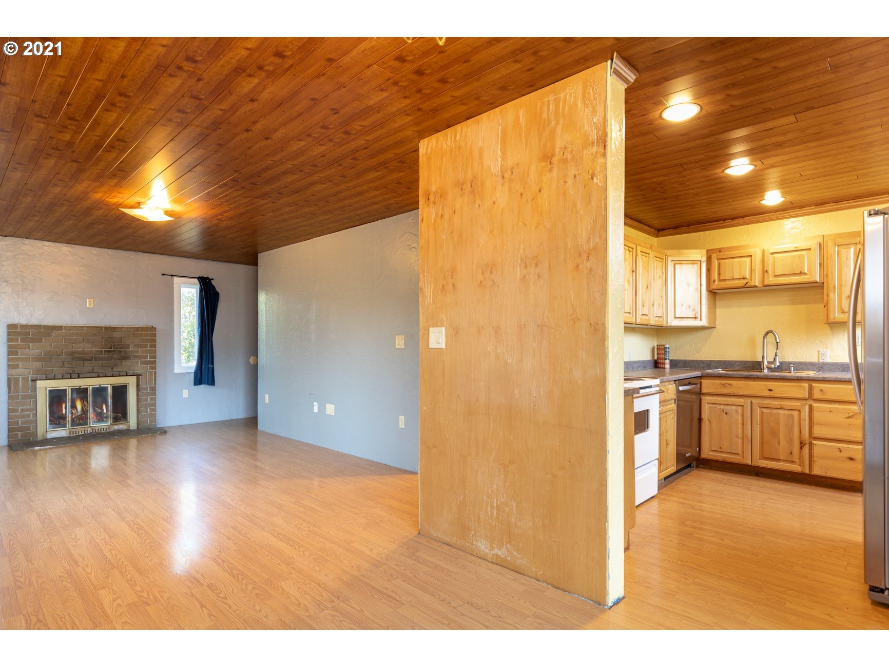 580 3rd Avenue Riddle, OR 97469 - Photo 8 of 30 a view of a kitchen with a sink and a stove top oven