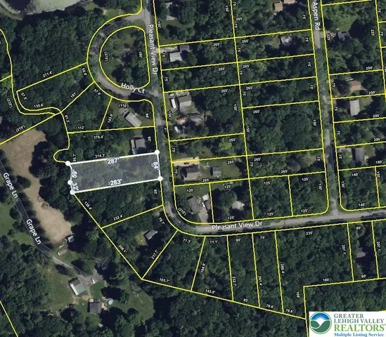 a room with water heater and wooden floor