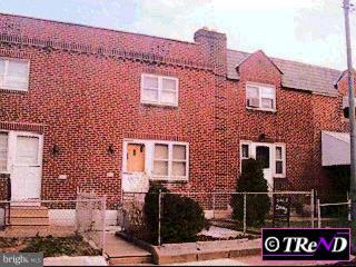 565 Snowden Road Upper Darby, PA 19082 - Photo 1 of 1 a front view of a building with parking space