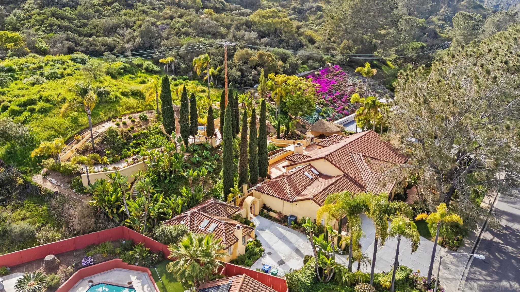 2969 Racetrack View Drive Del Mar, CA 92014 - Photo 58 of 59 an aerial view of a house with a yard