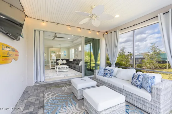 a living room with furniture and white walls