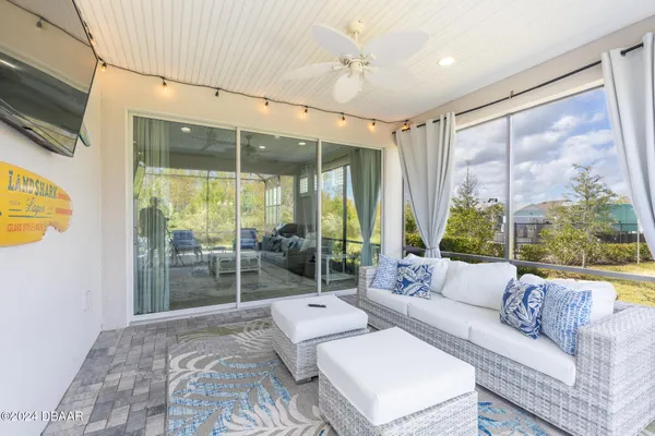 a view of swimming pool with outdoor seating