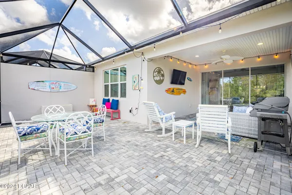 a bed room with a bed and a window