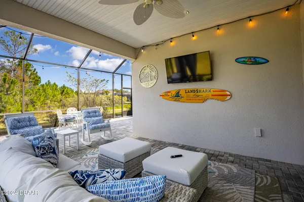 a bedroom with a bed and a flat screen television