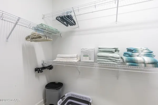 a bed room with a bed and a dresser